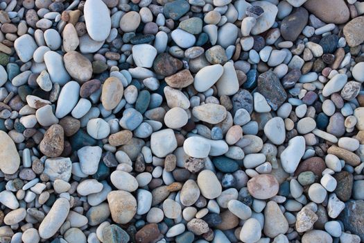 photo pebbles of various sizes on the beach