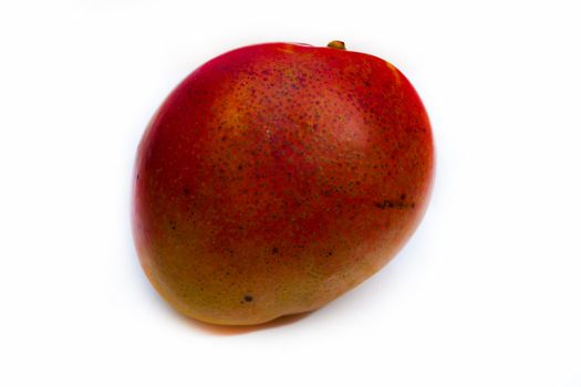 photo of a ripe mango krasnog on a white background