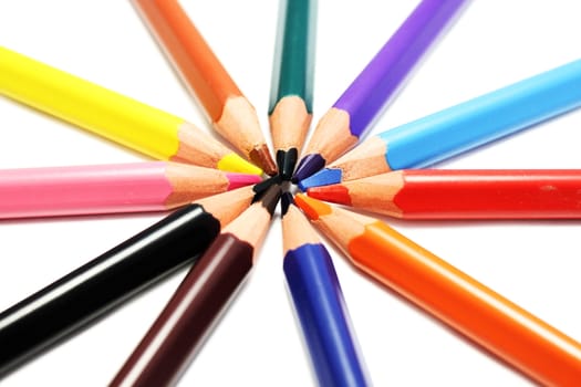 Colour wooden pencils for drawing on white background