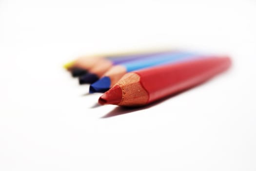 Colour wooden pencils for drawing on white background