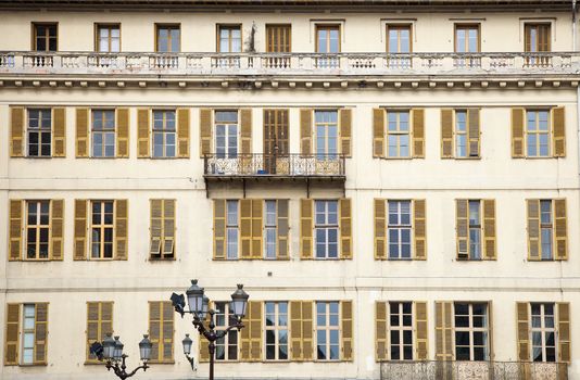 Windows with shutters in old buildings