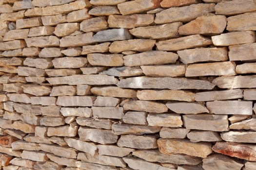 Closeup of stone wall use for construction business and designers