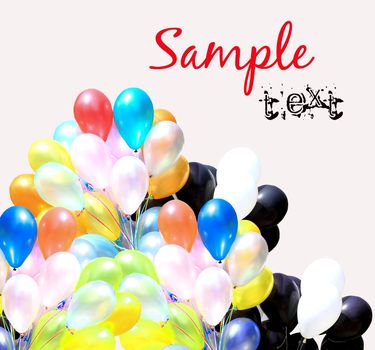 Colorful balloons on a white background with copy space and sample text