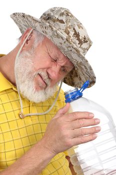 senior balding bearded man holding empty plastic bottle