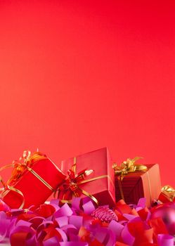 Christmas gifts over red background