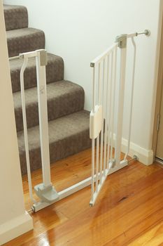 A shot of a child safety gate and stairs