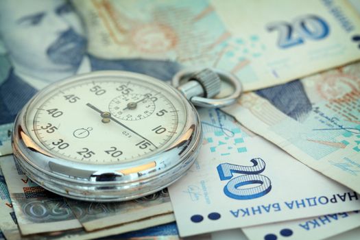 Chronometer and Bulgarian currency close up, shallow dof