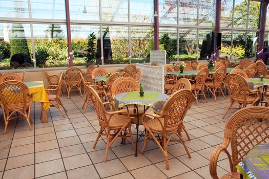 Open air beautiful summer cafeteria cafe coffee shop restaurant bistro in lovely colors
