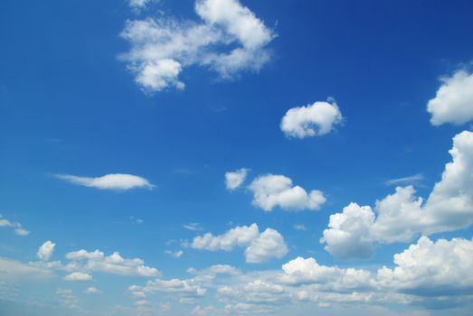 blue sky background with tiny clouds