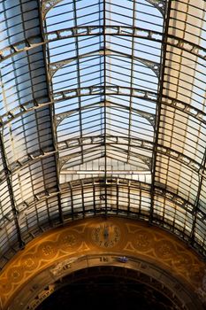 The Galleria Vittorio Emanuele II is a covered double arcade formed of two glass-vaulted arcades at right angles intersecting in an octagon, prominently sited on the northern side of the Piazza del Duomo in Milan.