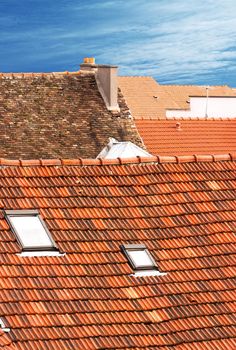 Landscapes of roofs with a blue sky in background