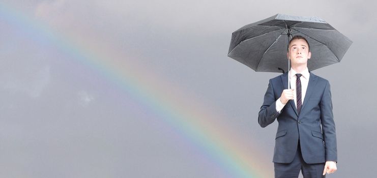 Worried business man on a rainy day