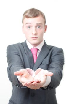 A business man begging for money on white