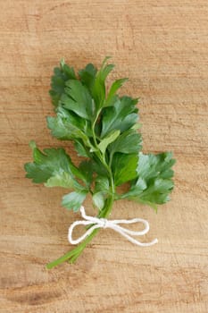 Parsley on a wooden surface