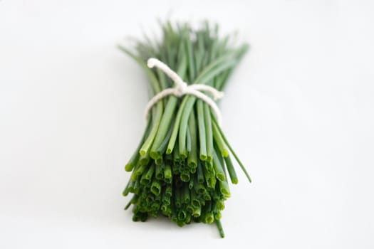 Chives on a wooden surface