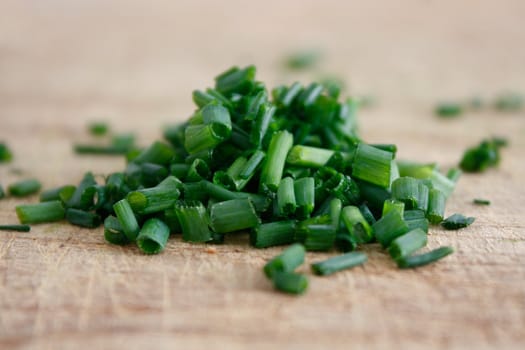 Freshly chopped fragrant chives in a horizontal composition