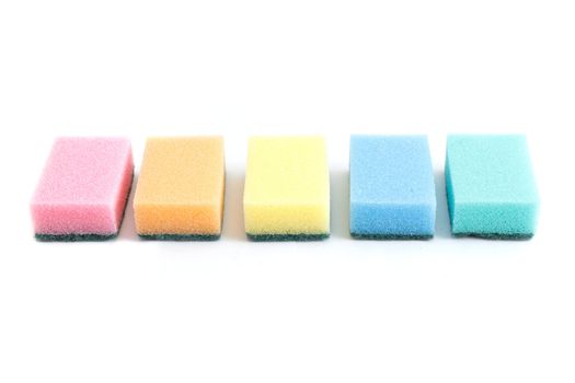Colourful sponges isolated on a white bg