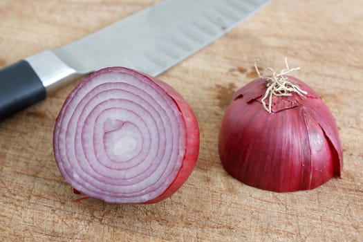 A red onion sliced in half