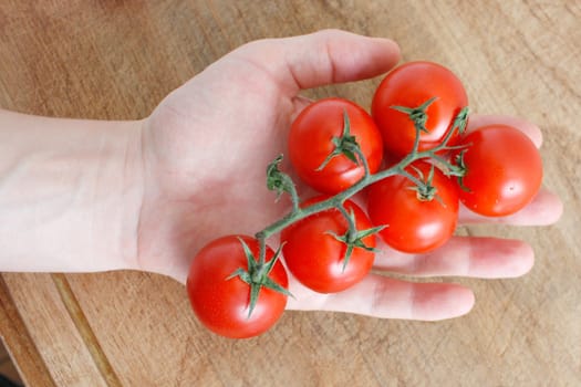 Delicious tomatoes on a chopping board