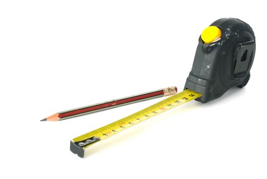 Old measuring tape and pencil, isolated