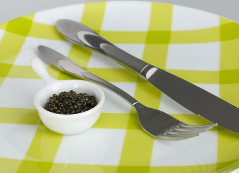 Bon appetite - caviar, fork and knife