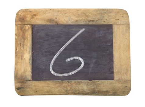 The number "6" written with white   on a blackboard