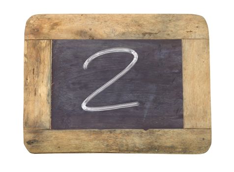 The number "2" written with white   on a blackboard