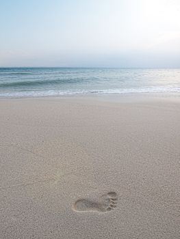 Footprint on the sandy shore in an island in Malaysia