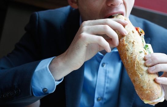 businessman eating lunch