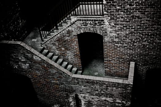 an old brick house with stairs, view from above