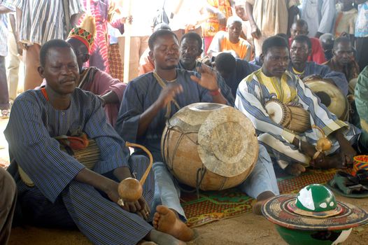 The festival of establishment of a usual chief in Burkina Faso Faso lasts three days. The usual chief succeeds his father deceased, it is always the groin of the family and always a man. It is a very rare event because a chief can be replaced only after his death. During establishment it is the festival and all the area is invited. This festival occurs to Kokemnour�, small village in the East of Burkina Faso Faso in the province of Kouritanga. These three days are punctuated of dance, meal and especially of traditional ceremonies African. The Chief is the King and can be established only by chiefs more important than him.                                