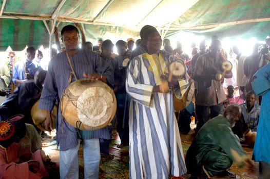 The festival of establishment of a usual chief in Burkina Faso Faso lasts three days. The usual chief succeeds his father deceased, it is always the groin of the family and always a man. It is a very rare event because a chief can be replaced only after his death. During establishment it is the festival and all the area is invited. This festival occurs to Kokemnour�, small village in the East of Burkina Faso Faso in the province of Kouritanga. These three days are punctuated of dance, meal and especially of traditional ceremonies African. The Chief is the King and can be established only by chiefs more important than him.