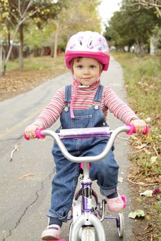 Little girl on bicycle