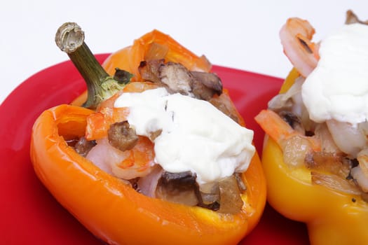 Stuffed pepper on a red plate