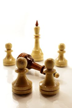 a few chess figures on the white bckground