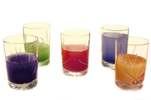 five colored glasses on the white background