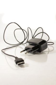 a phones's charging apparatus on the white backgroun