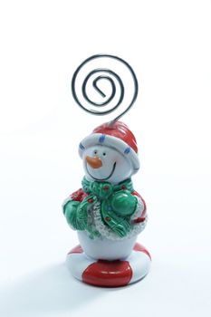 A snowman-toy on the white background