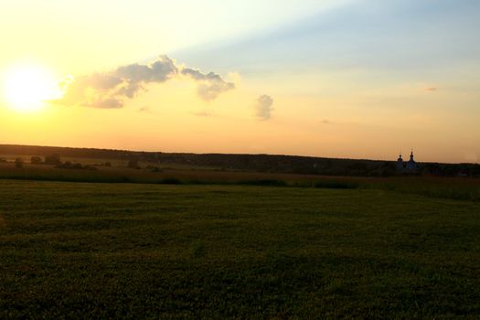 a sunset landscape in the field