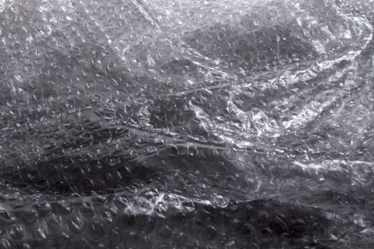 a cellophane texture as water in the rain