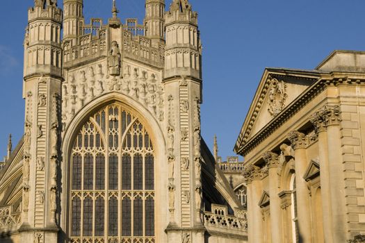 Abbey Churchyard in Bath, Somerset, England. Historic Georgian style buildings built of traditional honey colored sandstone.