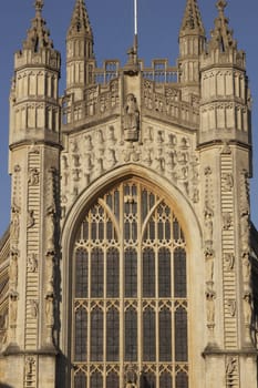 Historic Bath Abbey in Bath, Somerset, England. Historic Georgian style building built of traditional honey colored sandstone.