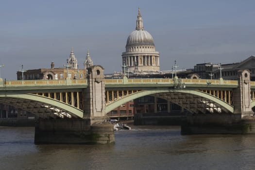 Dome of St Pauls Cathedral Southwark Bridge over the River Thames in London, England