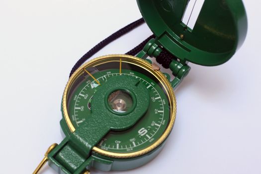 a green open engineer's directional compass