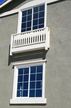 Close up of the windows of a house.
