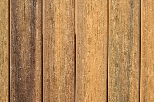 Close up of a wooden wall showing unique pattern.
