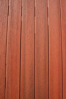 Close up of a wooden wall showing unique pattern.
