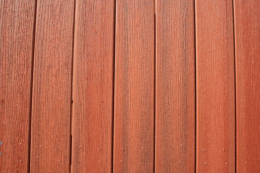 Close up of a wooden wall showing unique pattern.
