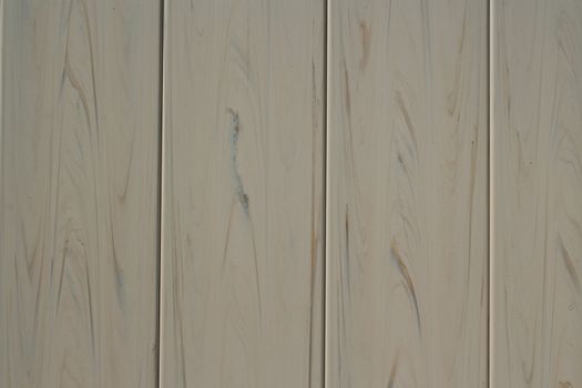 Close up of a wooden wall showing unique pattern.
