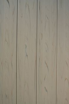 Close up of a wooden wall showing unique pattern.
